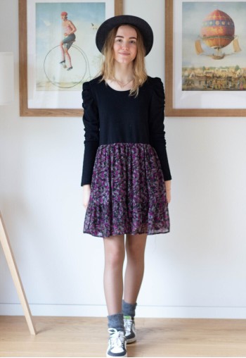 Black top and floral bottom dress