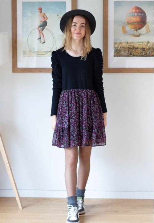 Black top and floral bottom dress