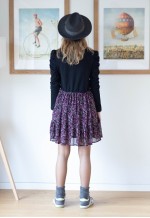 Black top and floral bottom dress
