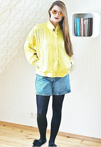 Bright yellow vintage lightweight raincoat jacket