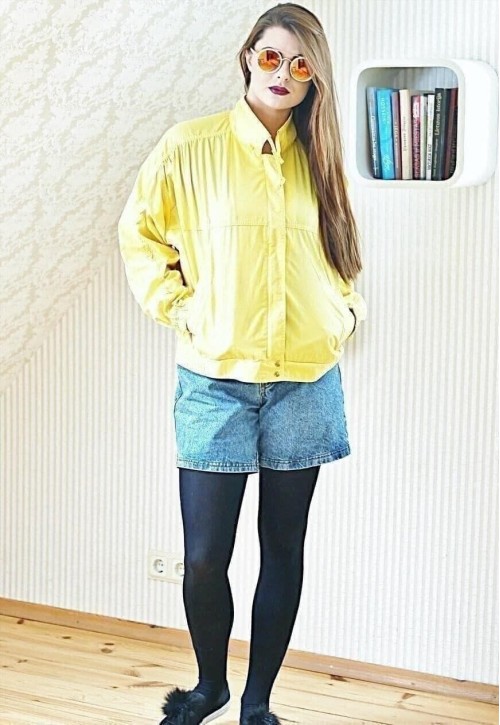 Bright yellow vintage lightweight raincoat jacket