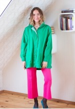 Bright green vintage raincoat jacket with a hood