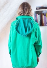 Bright green vintage raincoat jacket with a hood